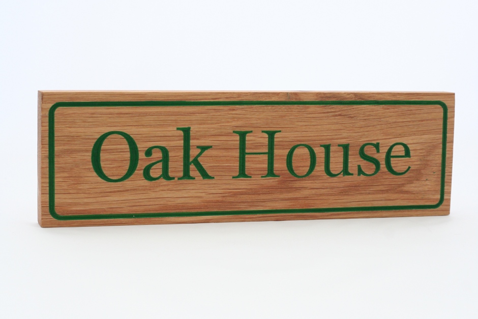 A sign for Oak House [1585]